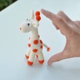 jucarie girafa in miniatura